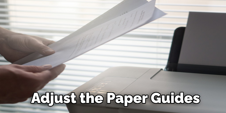 Adjust the Paper Guides